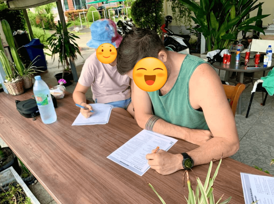 Student reviewing scuba diving knowledge by solving problems before the dive